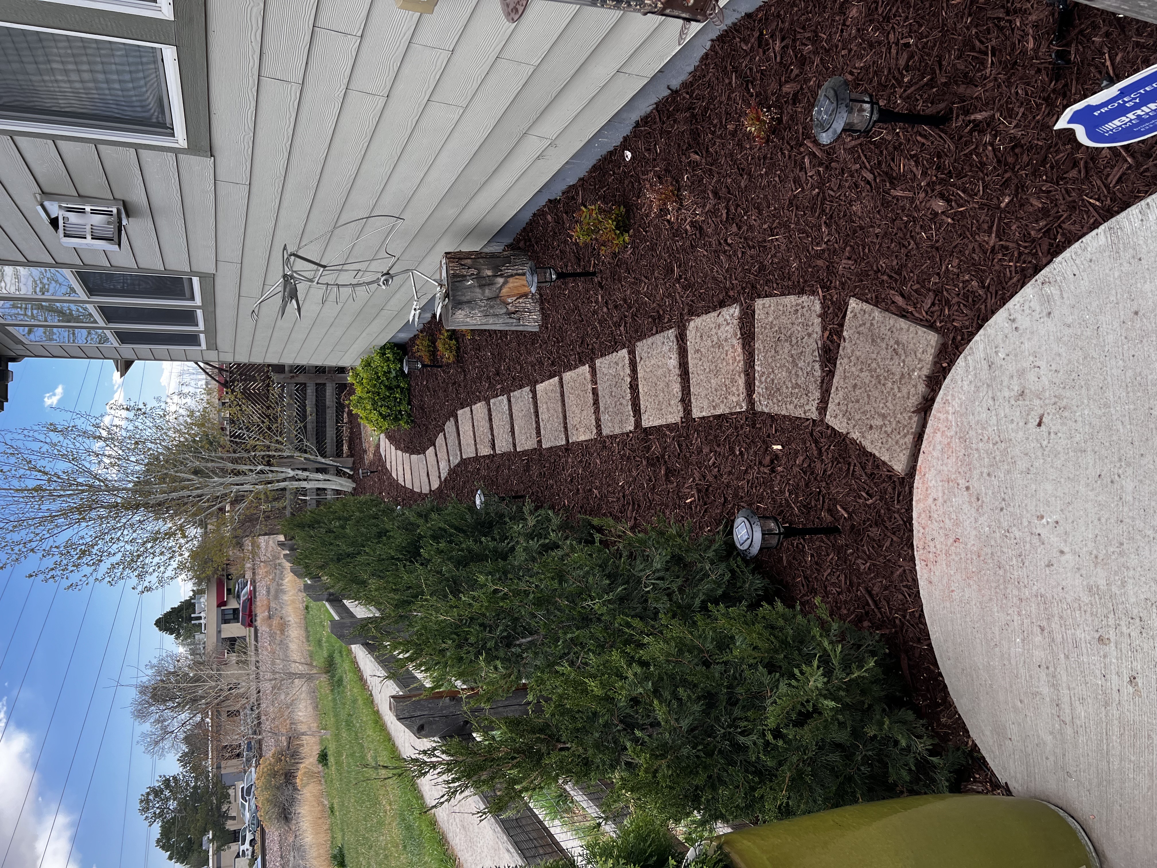 Professional mulching and landscape planting by Flora Landscaping